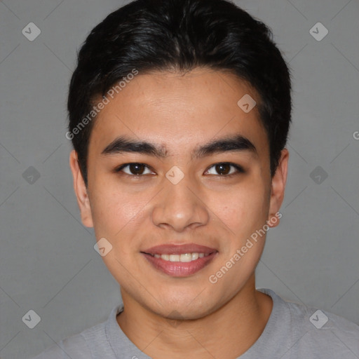 Joyful asian young-adult male with short  brown hair and brown eyes