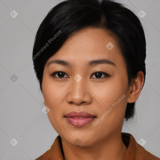 Joyful asian young-adult female with medium  black hair and brown eyes