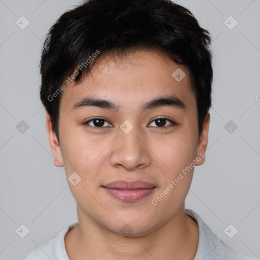 Joyful asian young-adult male with short  brown hair and brown eyes