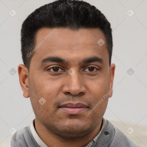 Neutral latino young-adult male with short  black hair and brown eyes