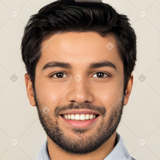 Joyful white young-adult male with short  black hair and brown eyes