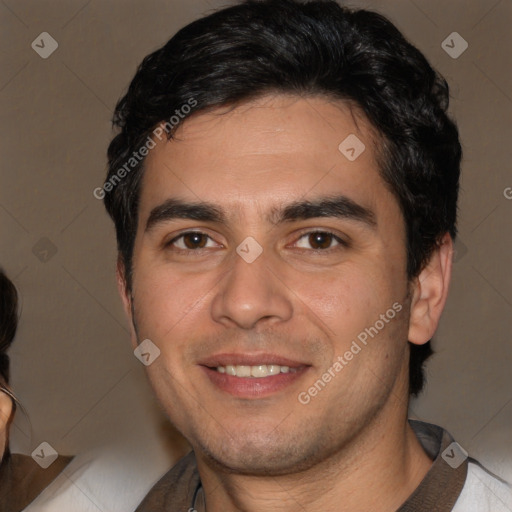 Joyful white young-adult male with short  black hair and brown eyes