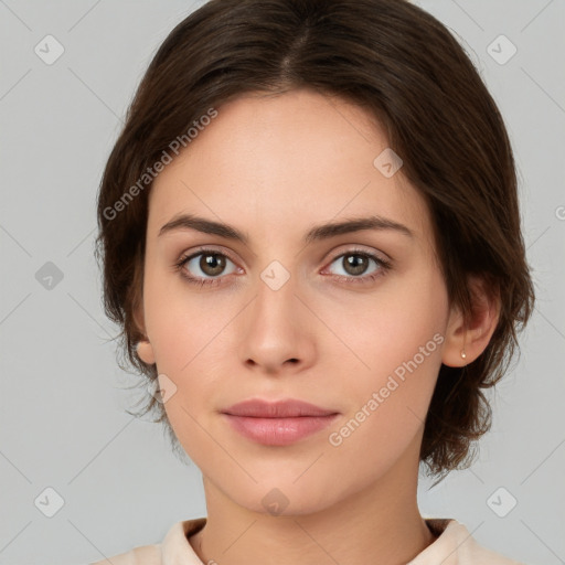 Neutral white young-adult female with medium  brown hair and brown eyes