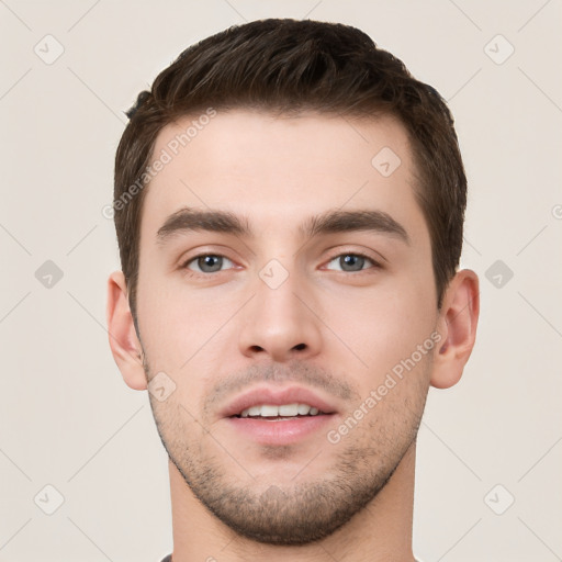 Neutral white young-adult male with short  brown hair and brown eyes