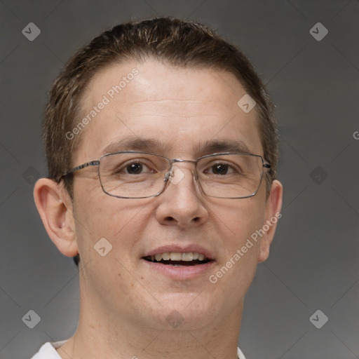 Joyful white adult male with short  brown hair and brown eyes