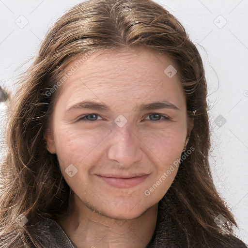 Joyful white adult female with long  brown hair and grey eyes