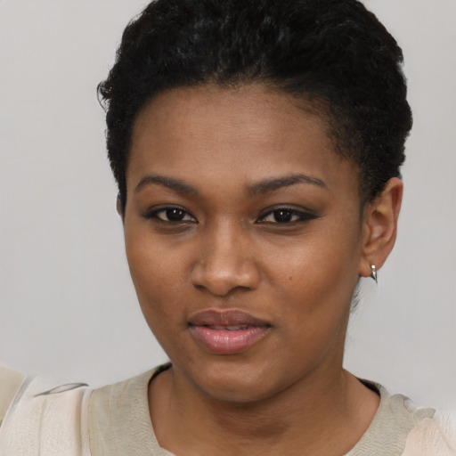 Neutral black young-adult female with short  black hair and brown eyes