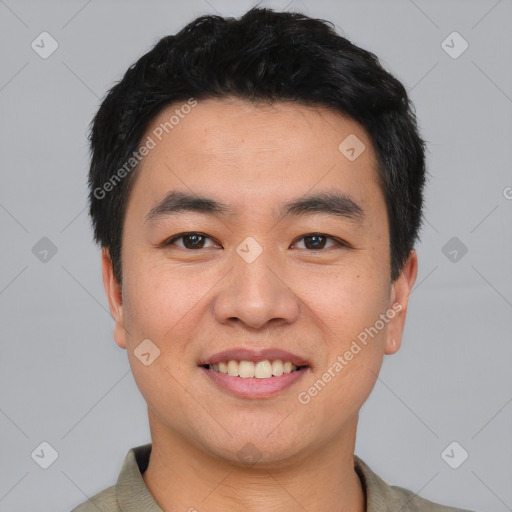 Joyful asian young-adult male with short  black hair and brown eyes