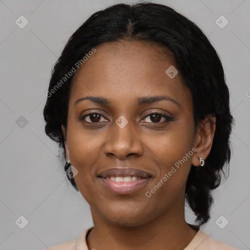 Joyful black young-adult female with medium  black hair and brown eyes