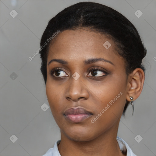 Neutral black young-adult female with short  black hair and brown eyes