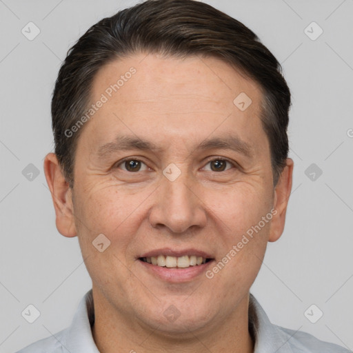 Joyful white adult male with short  brown hair and brown eyes