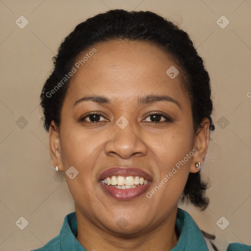 Joyful black adult female with short  brown hair and brown eyes