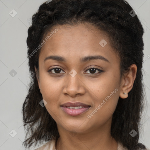 Joyful latino young-adult female with long  brown hair and brown eyes