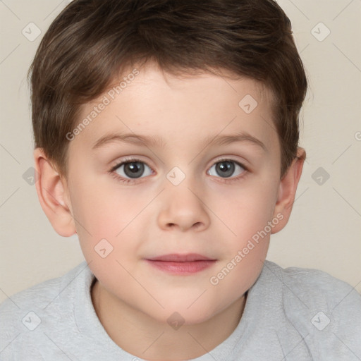 Joyful white child male with short  brown hair and brown eyes