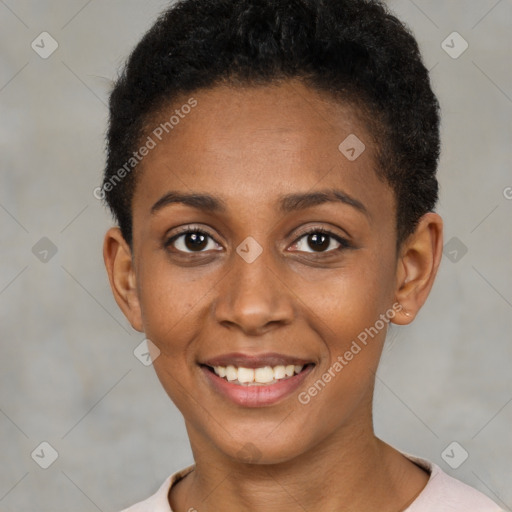 Joyful black young-adult female with short  brown hair and brown eyes