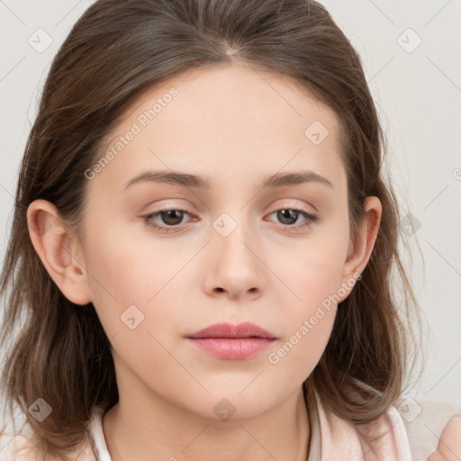 Neutral white young-adult female with medium  brown hair and brown eyes