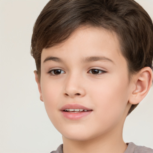 Joyful white child female with short  brown hair and brown eyes