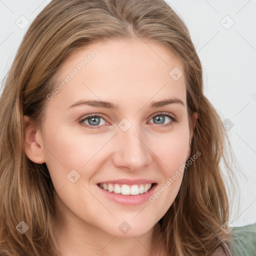 Joyful white young-adult female with long  brown hair and blue eyes