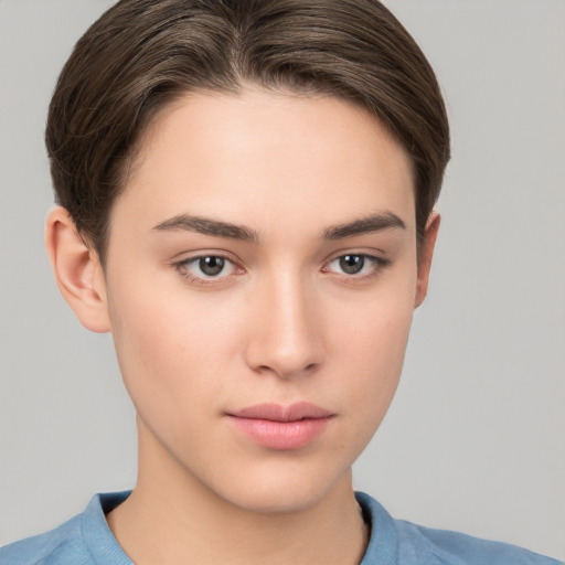 Neutral white young-adult female with short  brown hair and brown eyes