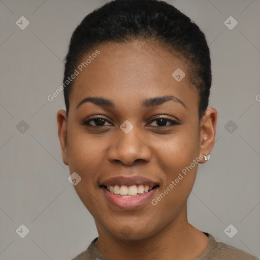 Joyful black young-adult female with short  black hair and brown eyes