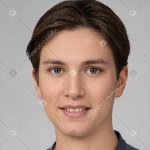 Joyful white young-adult female with short  brown hair and grey eyes