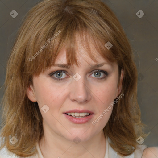 Joyful white young-adult female with medium  brown hair and blue eyes