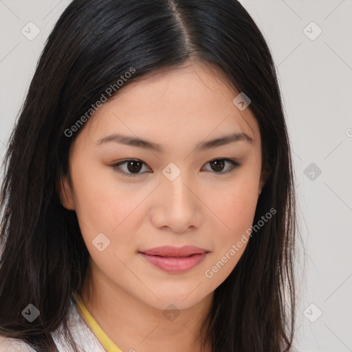 Joyful asian young-adult female with long  brown hair and brown eyes