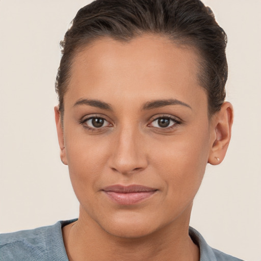 Joyful white young-adult female with short  brown hair and brown eyes