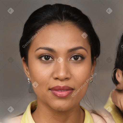 Joyful latino young-adult female with medium  brown hair and brown eyes