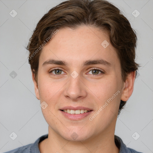 Joyful white young-adult female with short  brown hair and grey eyes