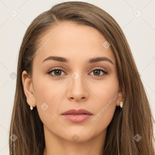 Neutral white young-adult female with long  brown hair and brown eyes