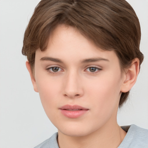 Neutral white young-adult female with short  brown hair and brown eyes