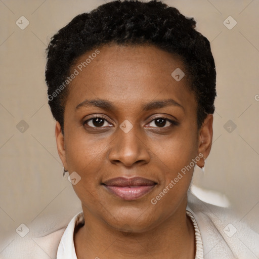 Joyful black young-adult female with short  black hair and brown eyes