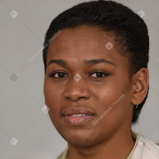 Joyful black young-adult female with short  brown hair and brown eyes