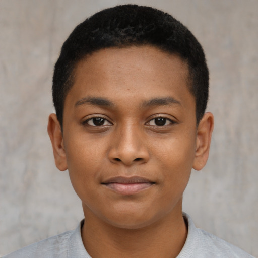 Joyful black young-adult male with short  brown hair and brown eyes