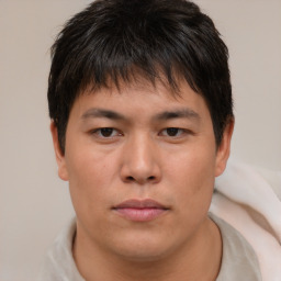 Neutral asian young-adult male with short  brown hair and brown eyes