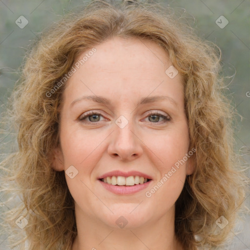 Joyful white young-adult female with medium  brown hair and green eyes