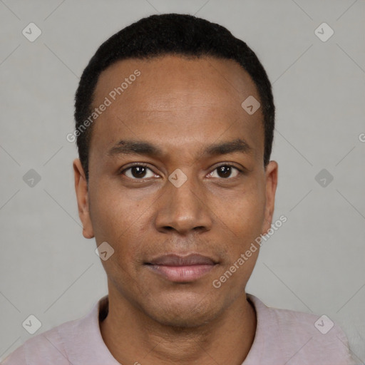 Neutral latino young-adult male with short  black hair and brown eyes