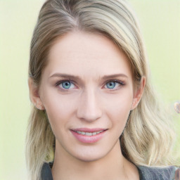 Joyful white young-adult female with medium  brown hair and blue eyes