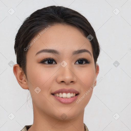 Joyful asian young-adult female with short  brown hair and brown eyes