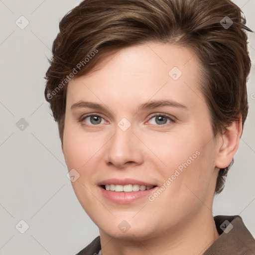 Joyful white young-adult female with short  brown hair and grey eyes