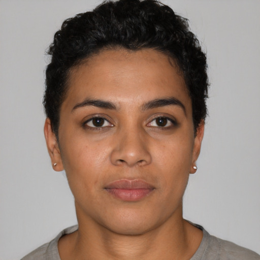 Neutral latino young-adult female with short  black hair and brown eyes