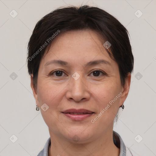 Joyful white adult female with short  brown hair and brown eyes