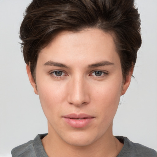 Neutral white young-adult female with short  brown hair and brown eyes