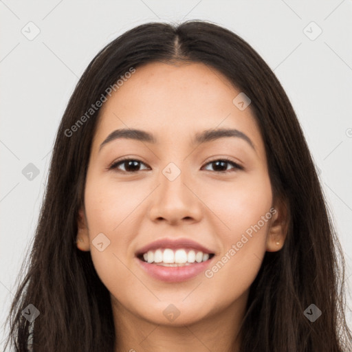 Joyful latino young-adult female with long  brown hair and brown eyes