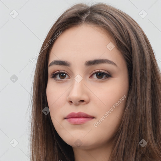 Neutral white young-adult female with long  brown hair and brown eyes