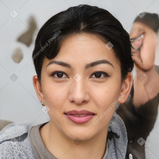 Joyful asian young-adult female with medium  black hair and brown eyes