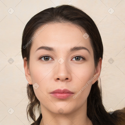 Neutral white young-adult female with medium  brown hair and brown eyes