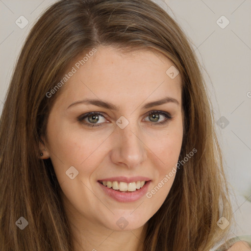 Joyful white young-adult female with long  brown hair and green eyes