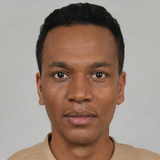 Neutral black young-adult male with short  black hair and brown eyes